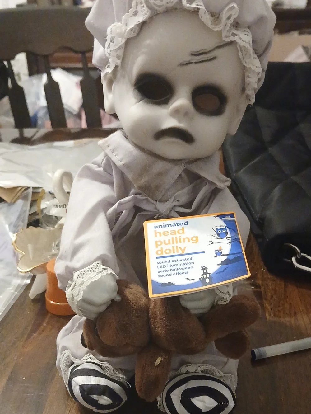 Animated Head Pulling Doll - Gray with Black and Brown Accents